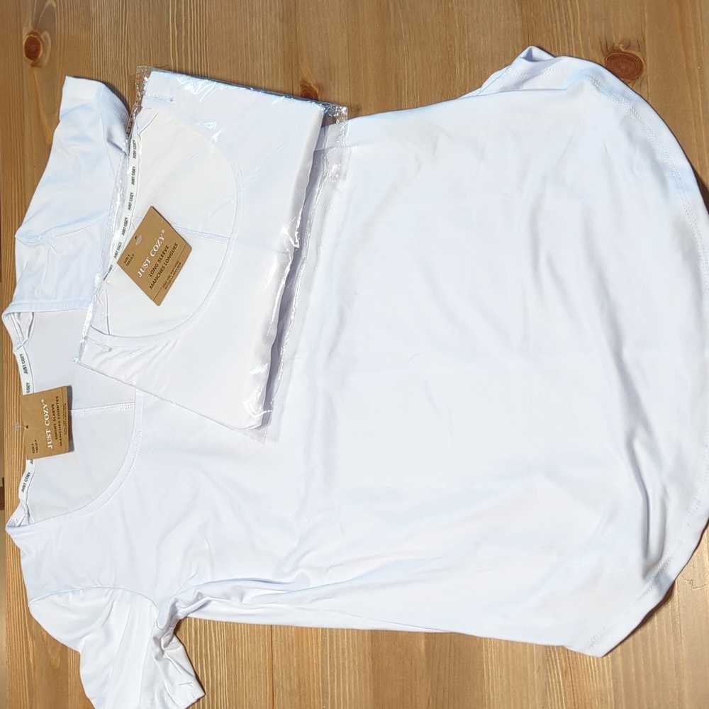 Pair of Just Cozy tunics in white. BNWT size small